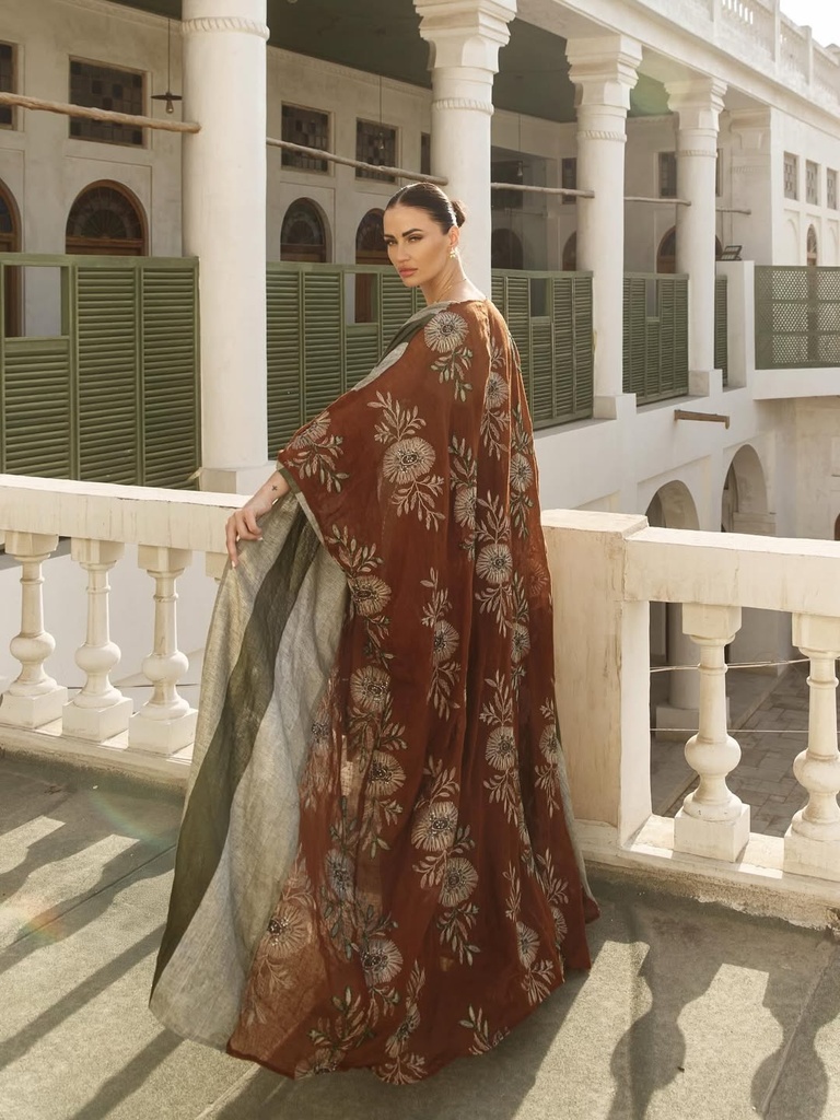 Lamu - لاموElegance inspired by coastal serenity, where earthy tones meet refined femininity in .jpg